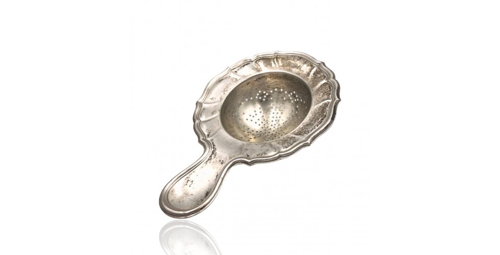 Tea strainer on the handle 